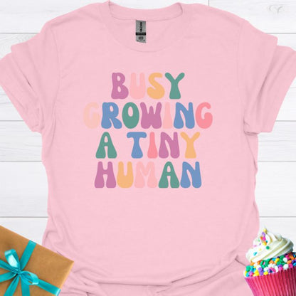 Busy Growing A Tiny Human T-shirt